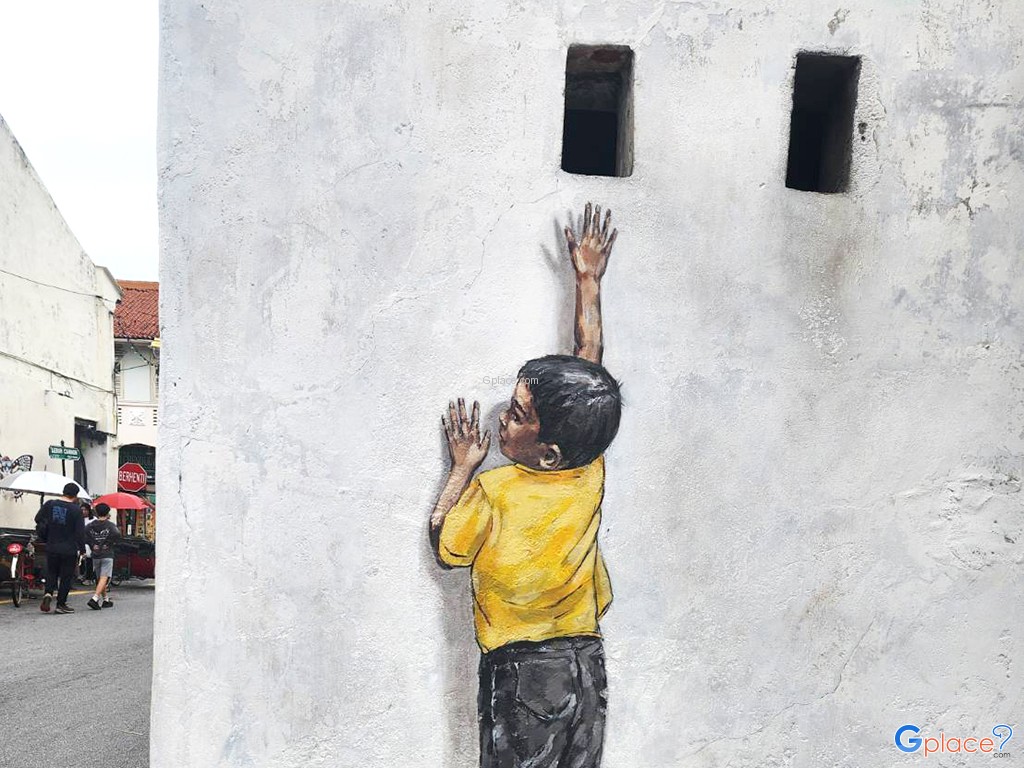 Penang Street Art   Boy on Chair by Ernest Zacharevic